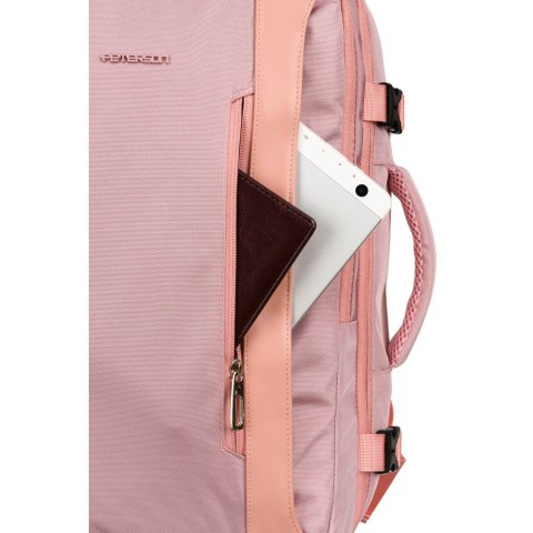 Plecak z miejscem na laptopa wykonany z cordury w różowym kolorze, zawieszony na regulowanych szelkach - Peterson