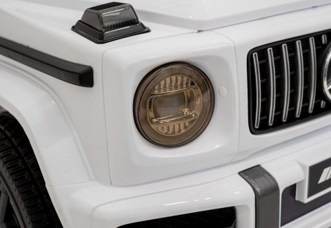 Mercedes AMG G63 dla dzieci Biały + Pilot + MP3 LED + Wolny Start + EVA + Pasy Mercedes AMG G63 dla dzieci Biały + Pilot + MP3 LED + Wolny Start + EVA + Pasy